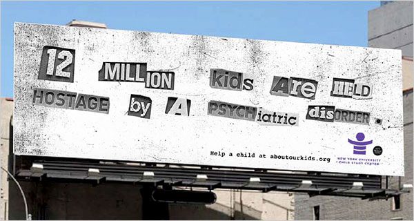 Image of an NYC billboard that reads "12 million kids are held hostage by a psychiatric disorder"