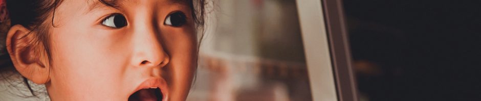 Fear of the dark - photo of young girl with a suprised expression on her face