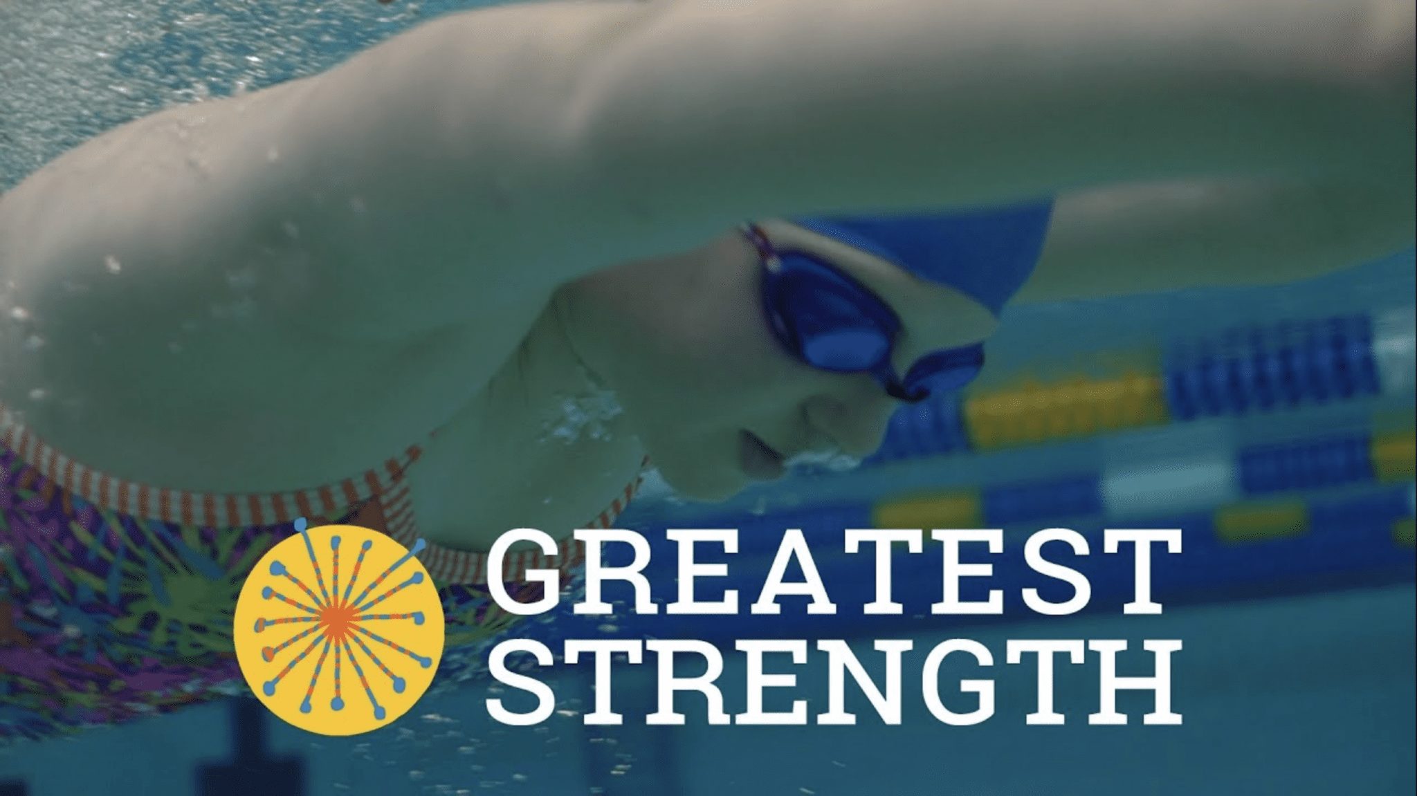 Closeup of girl with goggles race swimming in chlorine pool