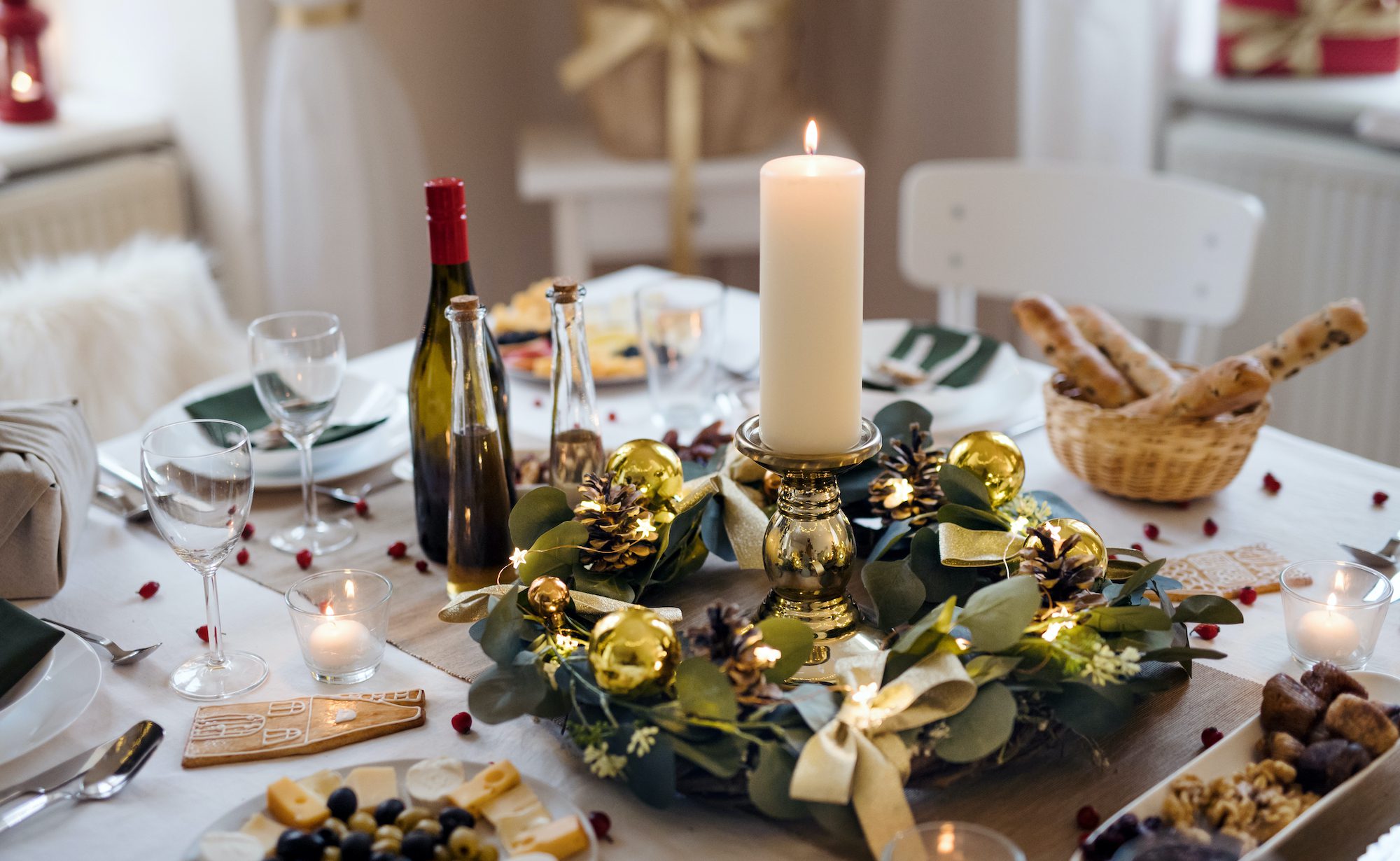 Empty chairs at a holiday dinner table