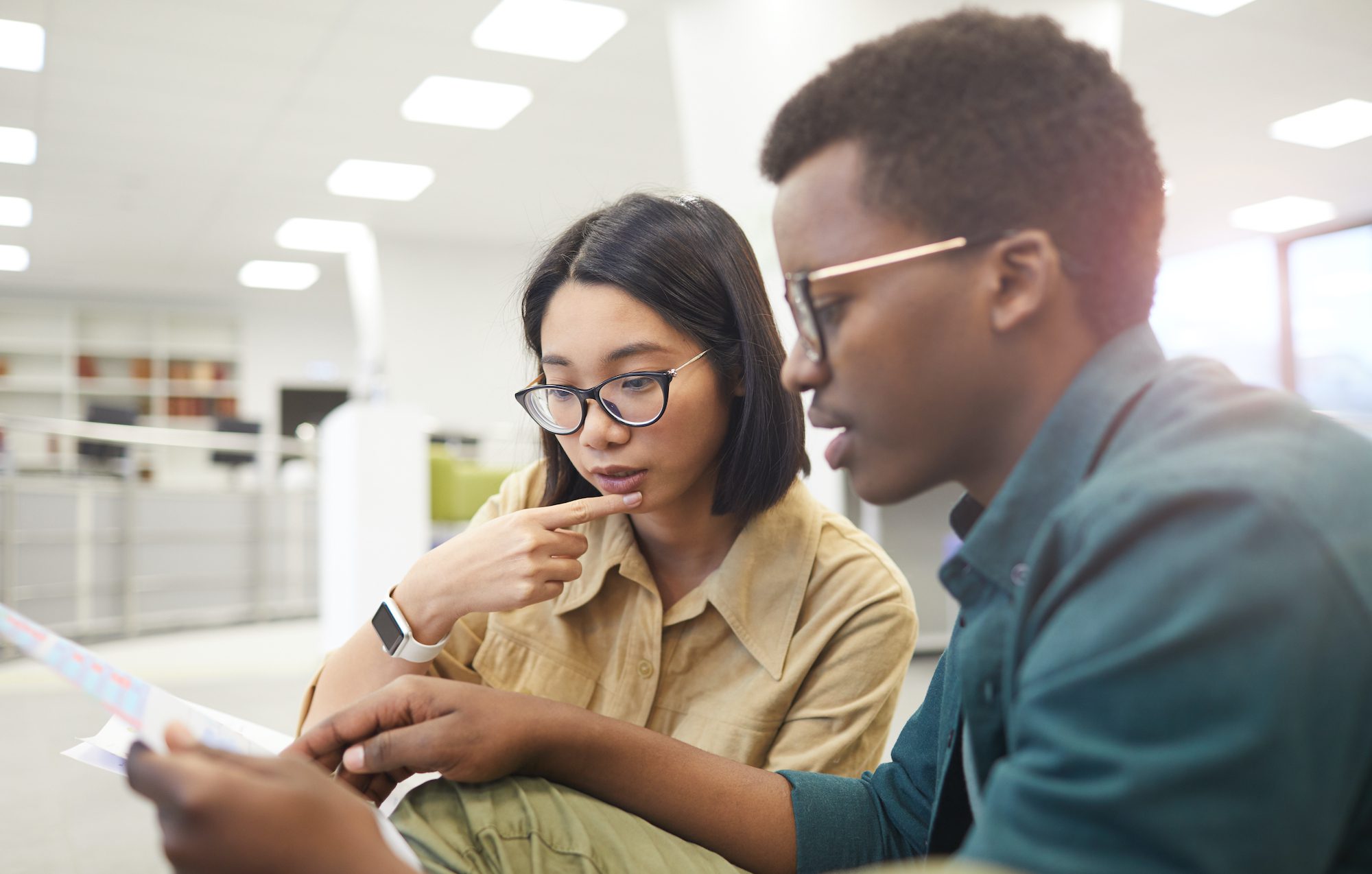 Two international students working on a project