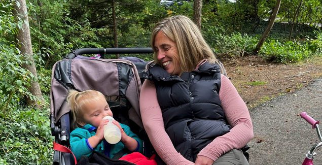 Michelle Marshall sitting outside with her niece smiling