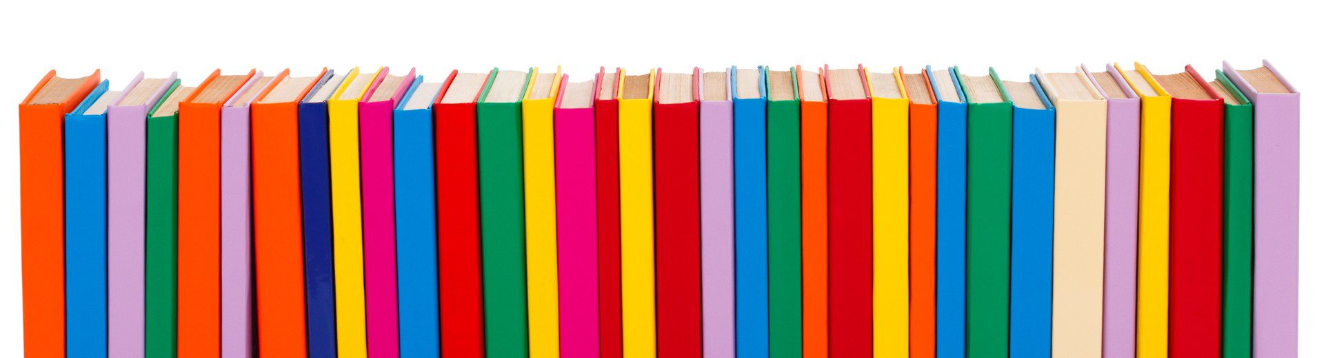 Long row of bright, multicolored books lined up