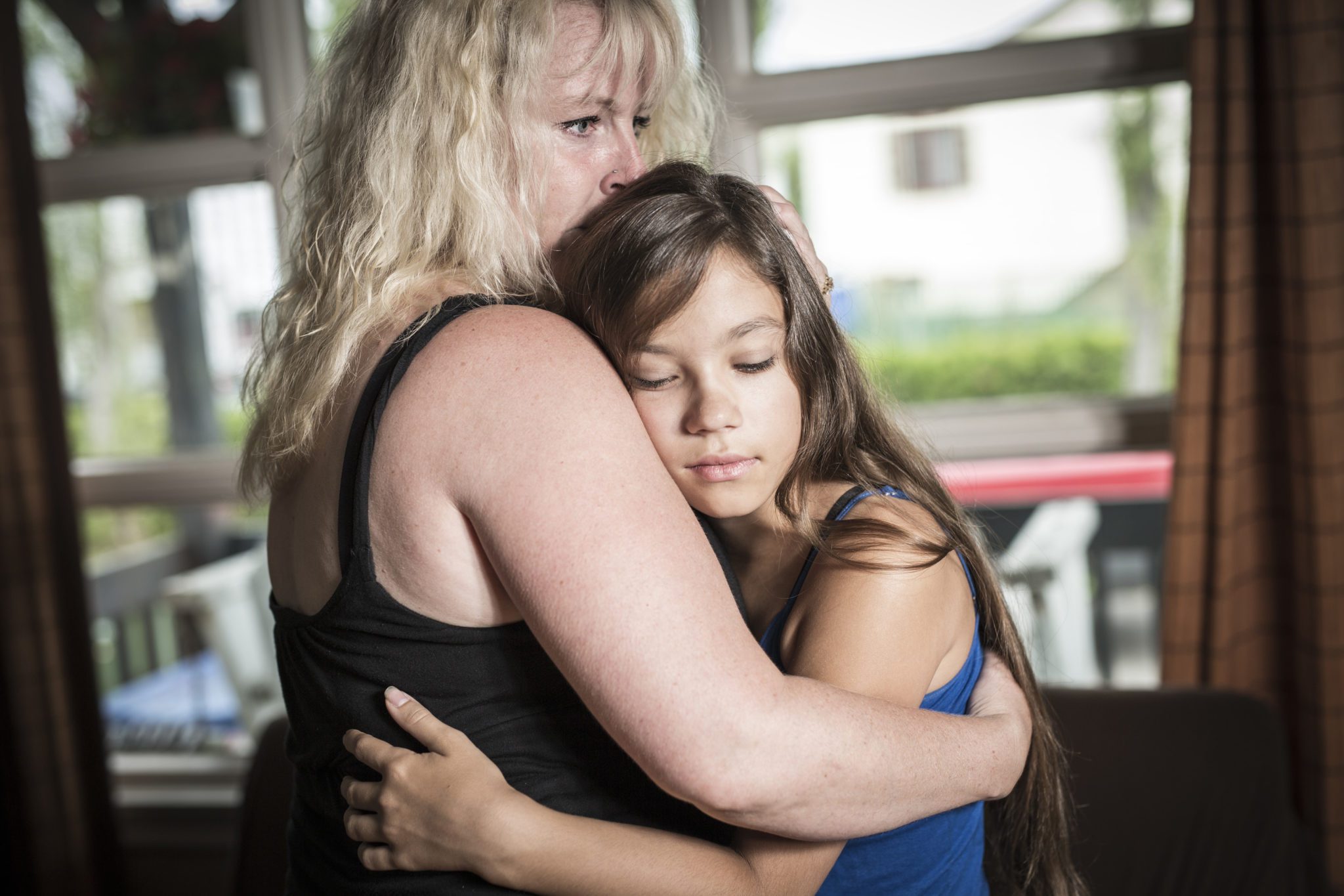 Another shooting - A Mother Comforting Teenage Daughter living room