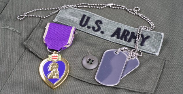 Purple Hearts - Military tags and Purple Heart award on US ARMY olive green uniform