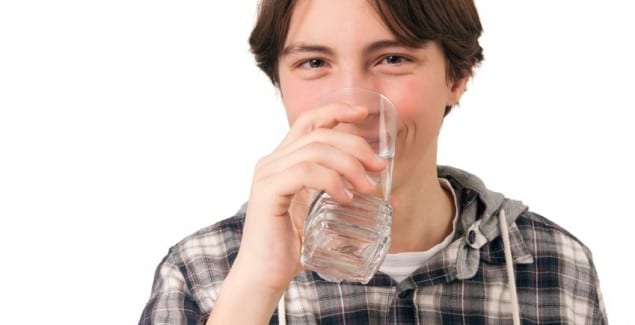 SSRI - Boy drinking a glass of water