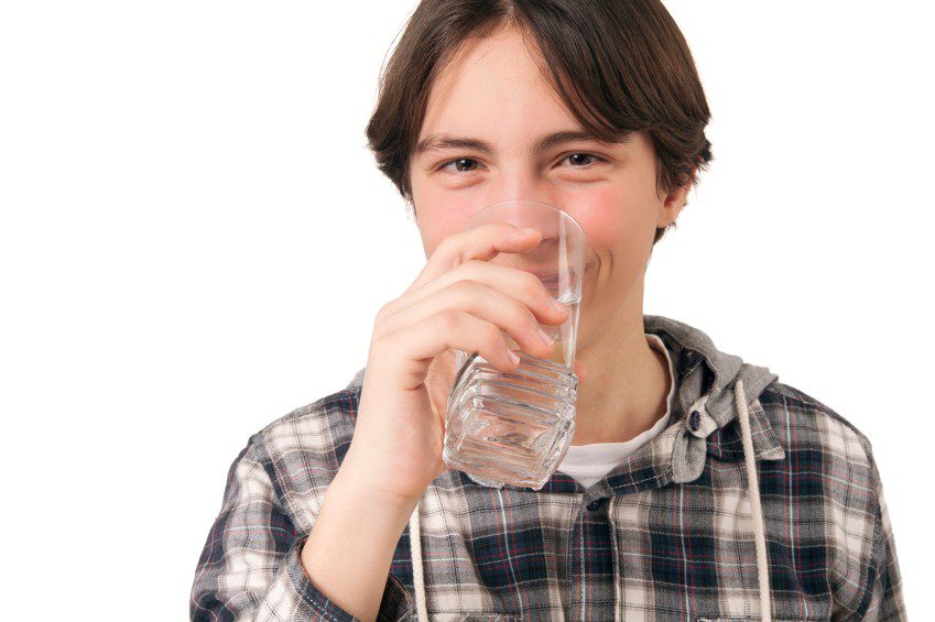 SSRI - Boy drinking a glass of water
