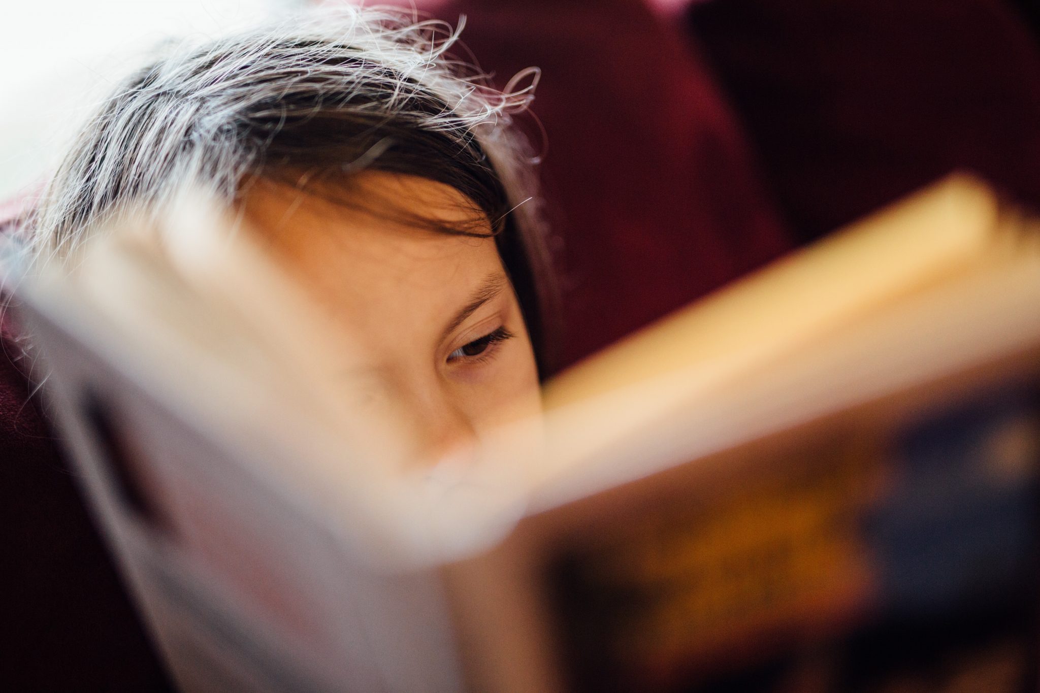 About Dyslexia - young girl reading a book