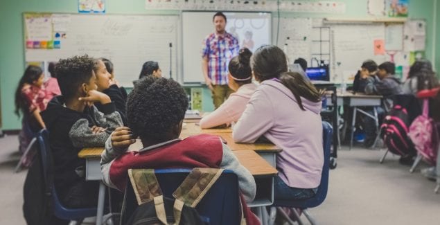 Children sitting in a classroom