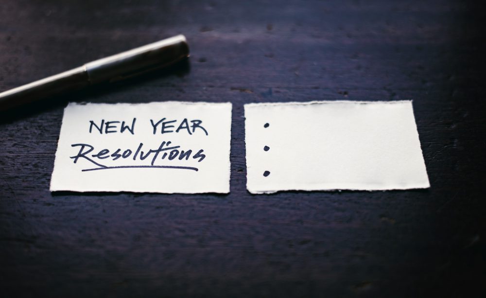 New Year's Resolutions - photo of empty piece of paper with bullets ready to be filled in