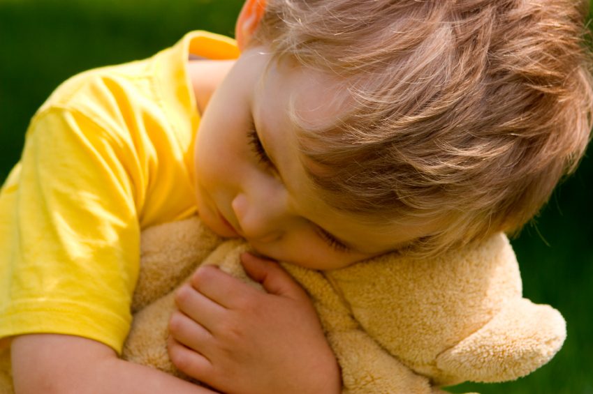 child holding toy